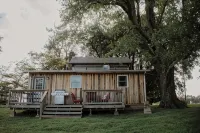 Rustic 1800s' Log Cabin with Modern Amenities on an Old Farm close to Owensboro