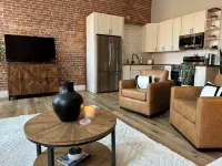 Stylish & Modern 2-Bdrm Apt in Downtown Warsaw featuring an urban rooftop deck.