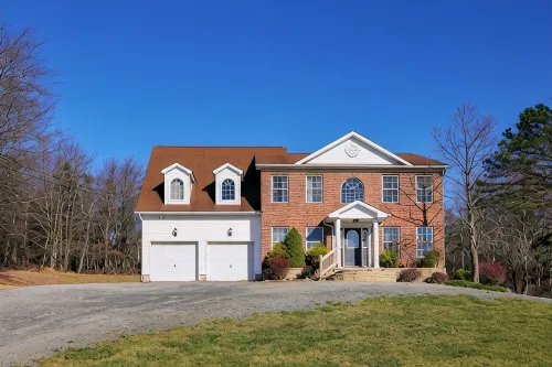 Spacious 6-bedroom Pocono Home with Hot Tub, Game and Theater rooms, Fire Pit! - 5-Star