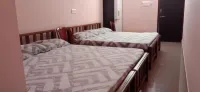 Palguni Lodge Hotels near Shri Gadi Chamundeshwari Devi Gudi