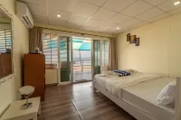 The Tito's Blue Sky Beach Resort - bar