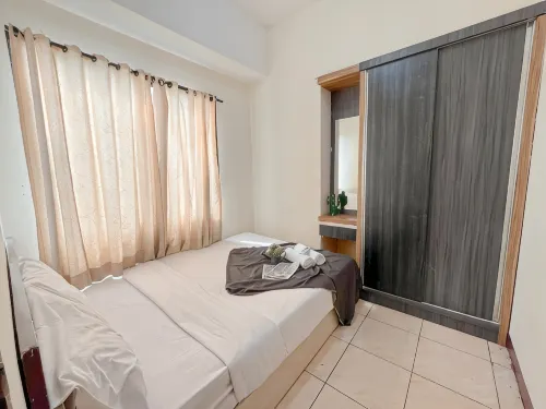 Simple 2BR Apartment at Tamansari Panoramic By Travelio