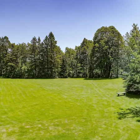 Historic prohibition Lodge next to golf course with private beach