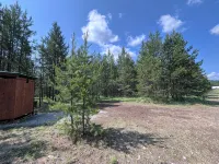 Retreat to our cozy cabin nestled in a private hideaway.Solar lights & shower