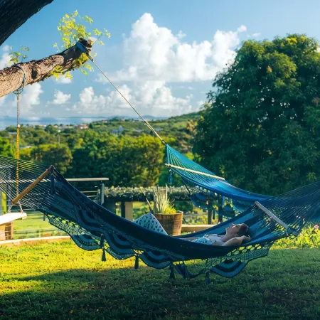 Tiny house on an acre with ocean view and private infinity pool.