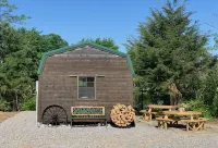 Big Mike's Cabin on the lake, next to ball diamonds nestled in 3 -cabin village