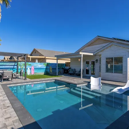 Seaside Cottage in walking distance of downtown Gilbert with charming pool.