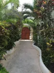 Quiet and serene ocean front 2-bedroom 2-bathroom condo, steps from the sand!