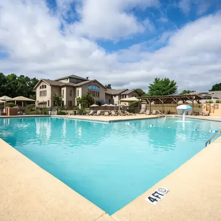 Walk in NO STEPS 2 Bedroom Condo in Gated Pointe Royale Golf Village with Pools
