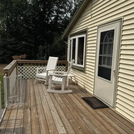 Cute Cabin on Big Pine Lake with a Large Fenced Yard and Lake Access