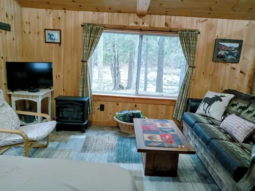 White Mountain Scenic River Camp with Cozy Cabin & Comfy RV