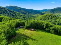 Scenic Mountain Getaway with a Firepit and Amazing Views of Mountains and Horses