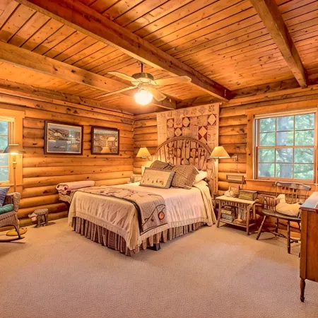 Mountaintop log cabin w/ wood stove hot tub and grill near Lake Chatuge