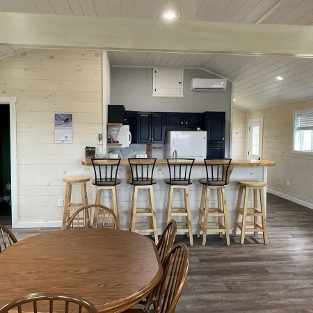 Family friendly cottage, covered deck, close to lake to fish, swim, and boat