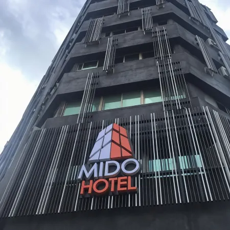 Traveller Inn Mido Hotel Отели рядом с достопримечательностью «Парк Paposogan»