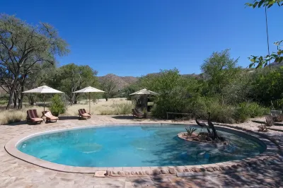 Huab Lodge & Bush Spa Hotels near Rock Engravings at Peet Alberts Koppie