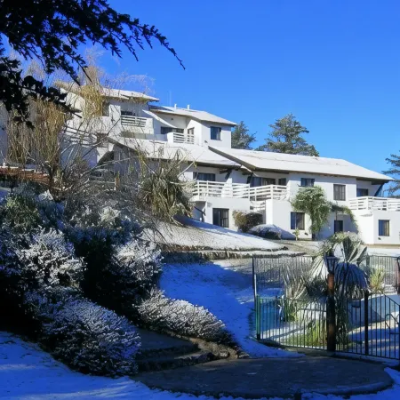 Las Ardillas Cabañas y Suites Отели в г. Пунилья