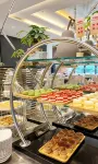 Jincheng Haoxiang Jinnian Hotel - servizio colazione