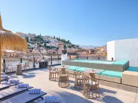 Boutique Hotel Luna Triunfo Granada Отели рядом с достопримечательностью «Беиро»