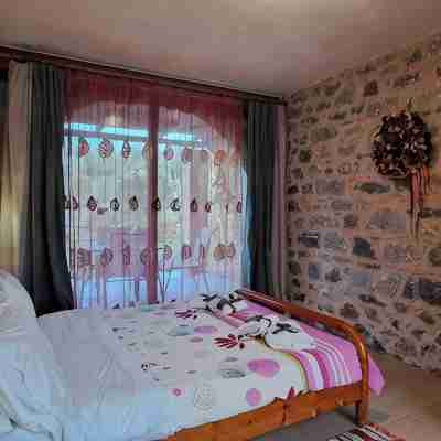 Lovingly furnished, family-friendly, secluded, natural stone bungalow Rooms