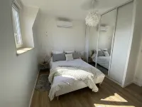 Large elegant apartment in the heart of Epernay. Quiet top floor with lovely view.