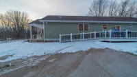 Charming 3-Bedroom House in Michigan City is Handicapp Friendly with a Ramp.