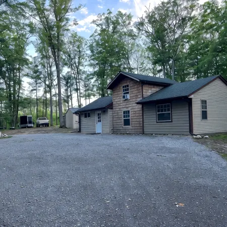 Cabin in the Woods, 10 Acres, Sleeps 8. Close to Orv Trails and Forest Dunes.