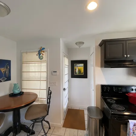 One mile to the beach! 2 br condo with deck, A/C, full kitchen, washer, dryer