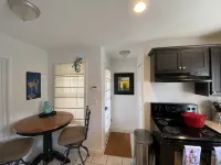 One mile to the beach!  2 br condo with deck, A/C, full kitchen, washer, dryer - Gym