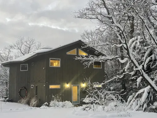 Osseo Lake Lodge  Unique Octagon Home with Sunset Views & Private Waterfront - balcony