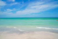 “ Living the Dream “ in our 3 bedroom 3 bathroom beachside condo with pool!