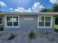 Lake House on the LEGOLAND Chain-of-Lakes with Private Pool, Beach and Boat Dock