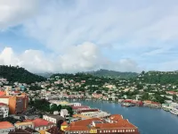 Modern Condo w/ Panoramic Views Walking Distance Between Grand Anse & BBC Beach - 3성급