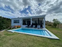 The Ranch At La Joya is a three bedroom modern farm house at Tres Palmas Estates - Pools