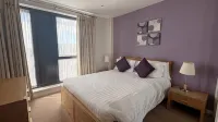 Liberty Wharf Apartments Отели в г. 
