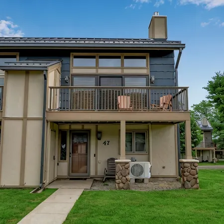 Updated townouse across from Holiday Valley - walk to ski lifts, pool and golf .