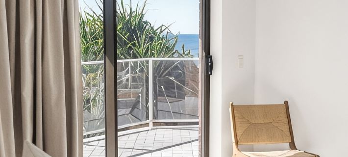 Wake up to Ocean Views ~ First Bay Vista Beachfront Apartment. Hotels in Coolum Beach