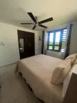 Charming 3-bedroom house with WiFi, AC in welcoming Rincón P.R. - شرفة