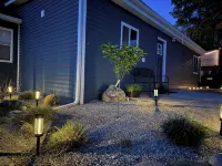 Spacious home near Torch Lake w/custom back patio, steps away from public access - 4-Star