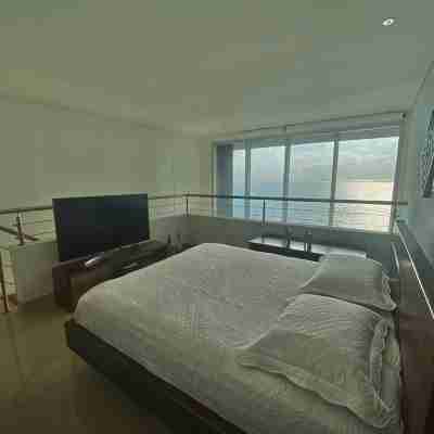 Exclusive beachfront loft apartment Rooms