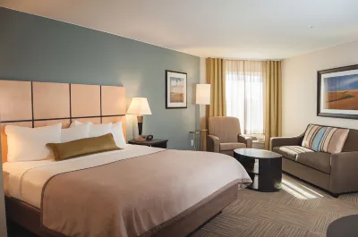 Candlewood Suites Fort Collins Отели рядом с достопримечательностью «Larson Barn»