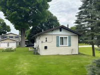 Chippewa Bluffs Resort Hotels near Fred Meijer White Pine Trail State Park