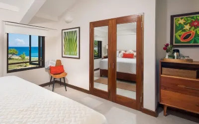 A beautifully renovated Caribbean Villa fronting a private seaside cove.