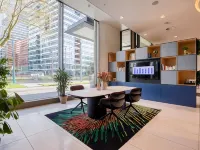 Premier Suites Amsterdam Hoteles cerca de Museo Van Loon