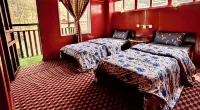 Lama Hotel - Himalayan Burger Hotéis em 