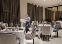 رمادا هوتل آند سويتس باي ويندام ييرفان - فطور