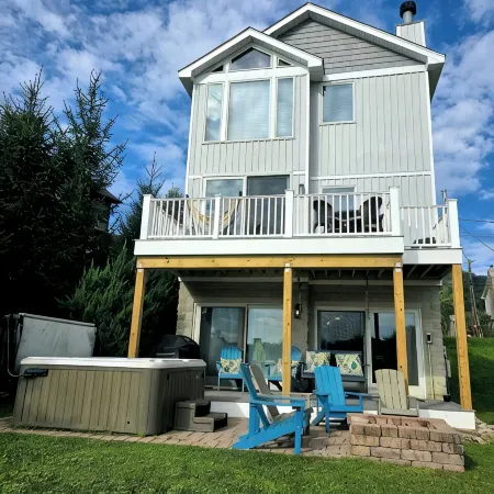 Lake Front Home w/ Hot Tub, Fire pit, yard, walk to Wisp Resort,Tubing Hill View