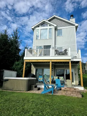 Lake Front Home w/ Hot Tub, Fire pit, yard, walk to Wisp Resort,Tubing Hill View