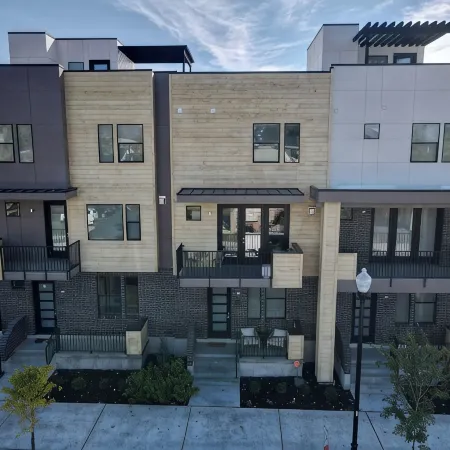 Downtown Modern 3-Bed Townhome with Bright, Upgraded Interiors & Books to read
