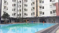 Comfort & Cozy 2BR at Cibubur Village By Travelio Hotel di Kecamatan Cimanggis